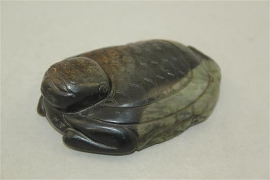 A Chinese grey and black jade figure of a recumbent turtle, 18th / 19th century, 12.5cm